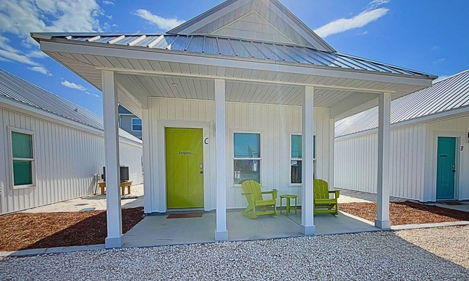 Port St. Joe Cabaña | "Dolphin Cottage" is a pet friendly, 2 bed, 1 1/2 bath unit accepting 5 guests. Community Pool.