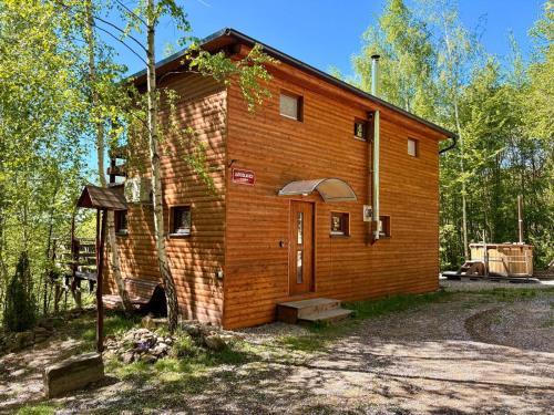 Kunratice u Cvikova Casa | Domek nad skálou