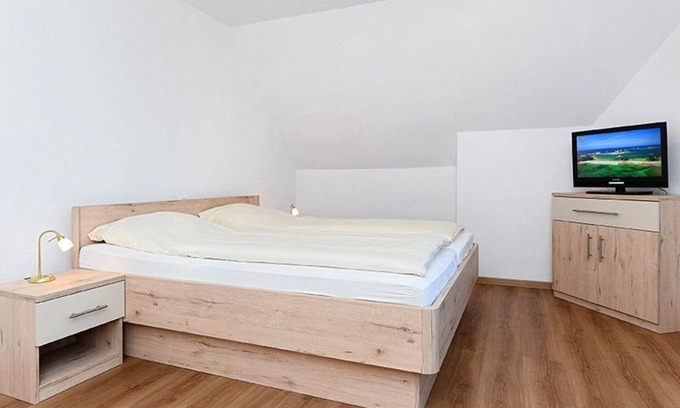 Neuharlingersiel Cabaña | Doppelzimmer mit Balkon Oder Terrasse - Doppelzimmer in der Hotel-pension Marlies