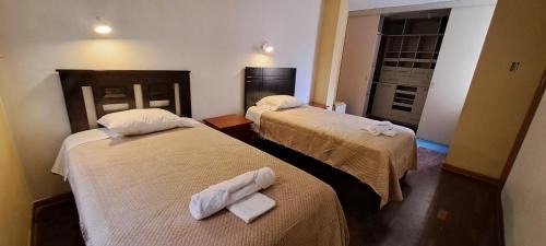La Perla Casa | Dormitorio con baño compartido a 25 minutos del Apto