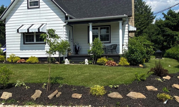 Ellwood City Casa | Drusilla’s Cottage Charming 3-bedroom house,AC, fitness room, garage & pavilion