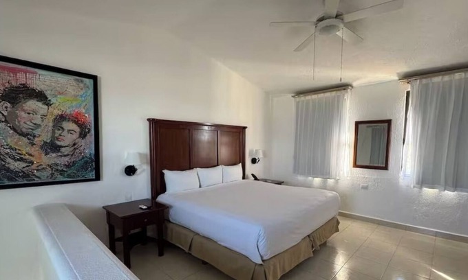 Puerto Juárez Complejo | Duplex-Style Ocean View Studio with Balcony at Family Friendly Cancun Resort