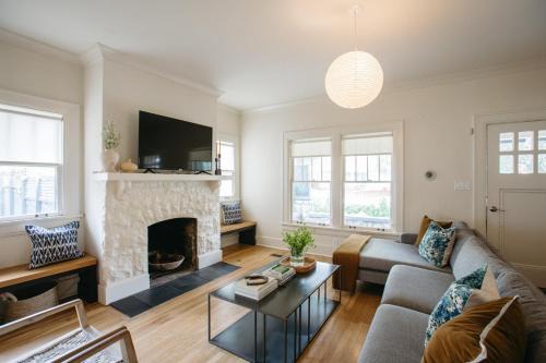 Eastwood Casa | East Nashville Retreat w Fireplace Backyard Firepit Outdoor Dining Minutes from Downtown Music Food Nightlife Chapel House by AvantStay