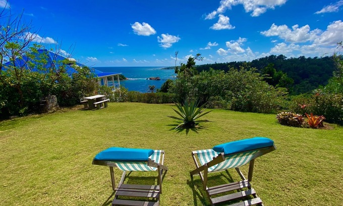 Calibishie Cabaña | Cabañas Sea Cliff # 5. Una casa de vacaciones totalmente equipada con una gran vista al mar.