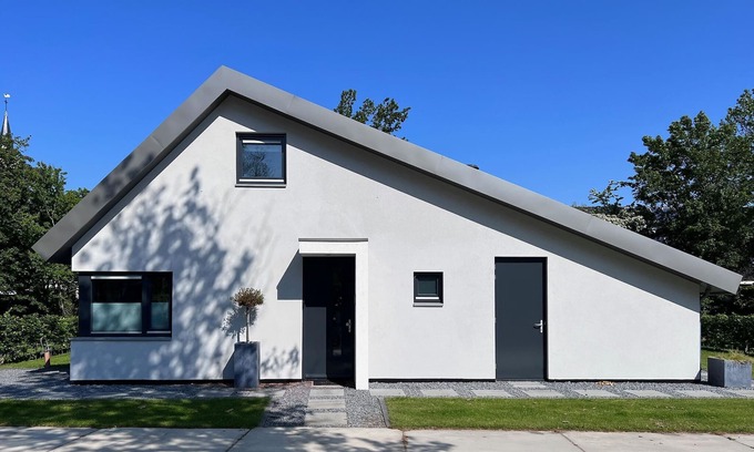 Dirkshorn Casa | Villa ecológica con terraza y jardín.