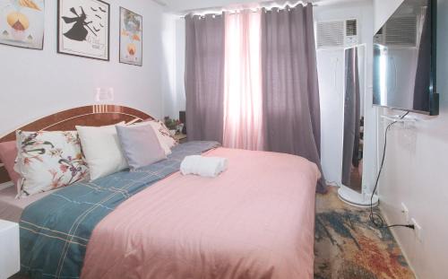 Highway Hills Hotel | Eimy's Place at Urban Deca Mandaluyong by RedDoorz