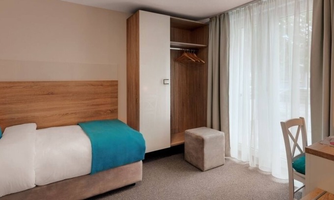 Reutin Apartamento | Habitación individual estándar con baño y ducha.
