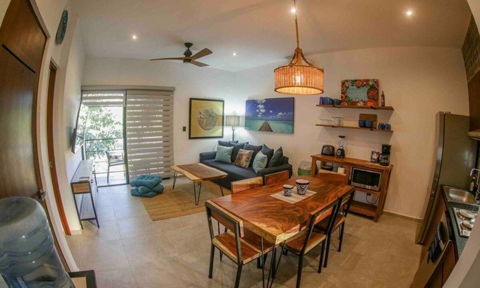 Mario Villanueva Madrid Condominio | Elegant 2-Bedroom 2-Bath Retreat with Rooftop Oasis & Pool