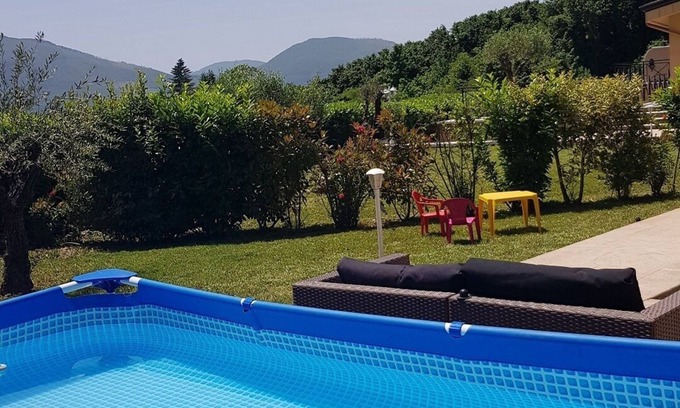 Avellino Villa | Villa elegante y confortable en la ciudad en un parque privado rodeado de vegetación.