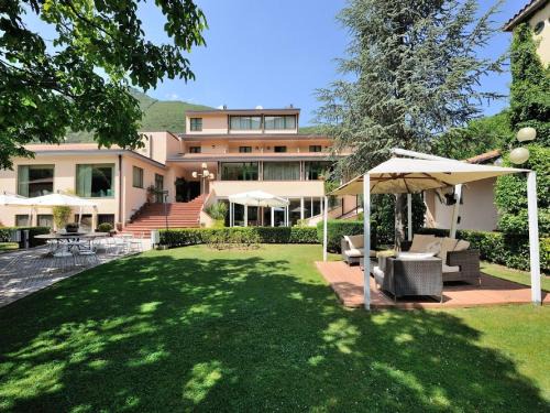 Foligno Casa | Elegant apartment in resort with swimming pool featuring nature and tranquillity
