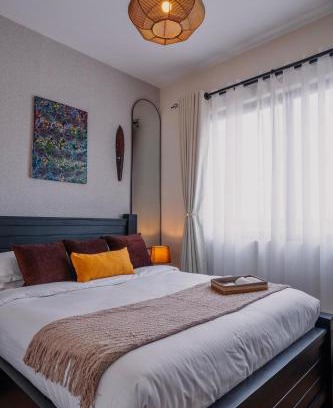 Kilimani Apartamento | Elegant Wilma Towers Apartment - Golden Sunsets and Ngong Hills View