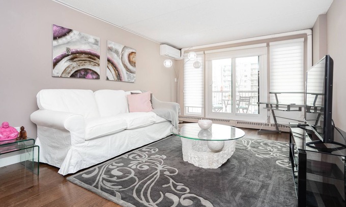 Fort Gary Apartamento | Condo de 2 dormitorios elegantemente diseñado (estacionamiento)