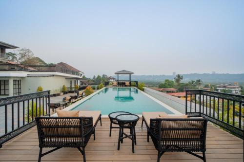 Saipem Apartamento | ELIVAAS 1 BHK with Rooftop Pool - Kamerios Verano