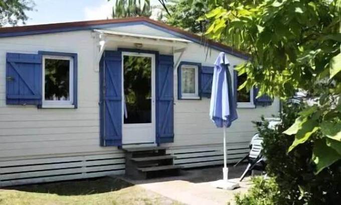 Biscarrosse Chalet De Esquí | En Chon Les Pins - Camping-Caravaning *** - Chalet wood 30m2 2 bedrooms n° 63 SATURDAY / SATURDAY 4 to 5 people - 4 pers. included in the tariff