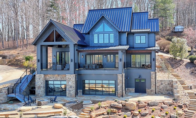 Elf Casa | Endless Sunsets By Chatuge Home Concierge private boat dock with covered boat slip and sun deck, bar, fire pit, pool table, kayaks