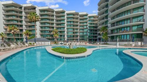 Orange Beach Casa | Enjoy a 3-bedroom Bayfront Condo with Lazy River Indoor Pool Jacuzzis and Community Boat Dock for Personal or Rented Boats Plus Redeem in Free Activity Deals Daily