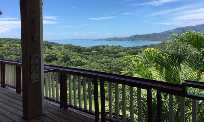 Tejas Casa | Enjoy ocean views and breezes as you relax in one of the hammocks on the deck