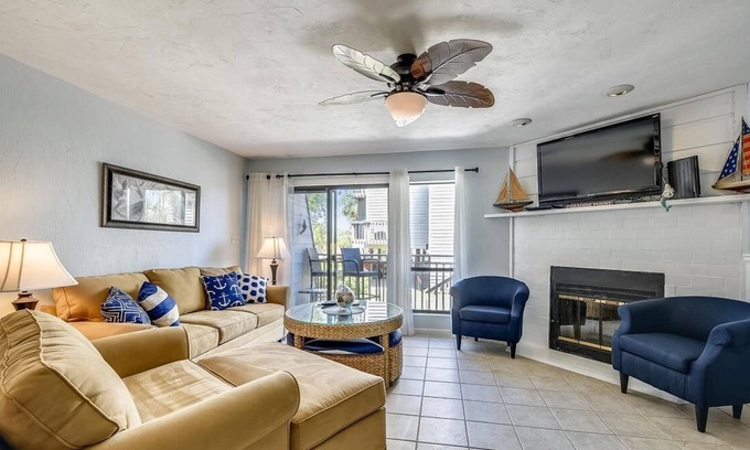 East End Casa | Enjoy this updated townhome with views of the gulf and pool from the deck.
