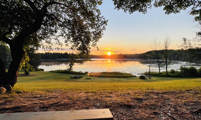 South Boardman Cabina | Escape to Serenity: Private Lake and Cozy Cabins for Rent