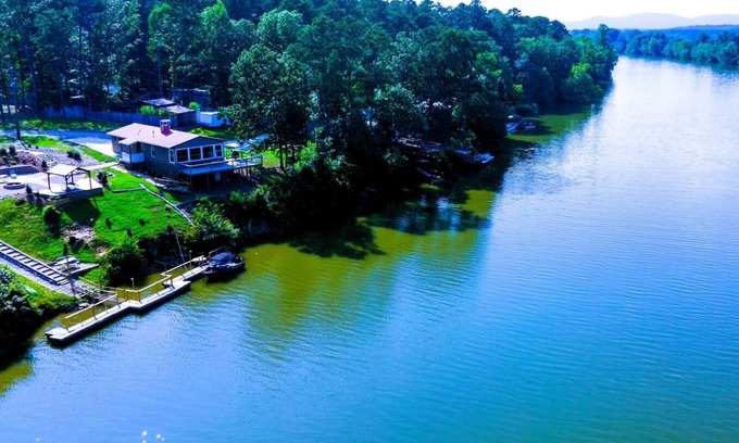 Cave Spring Casa | Escape to Tranquil Waters, where comfort meets calm. Enjoy serene river views and waterfront access, inviting spaces, and the perfect backdrop for rest, romance, or family fun. Boat Rental and Fishing Charters available anytime of the year.