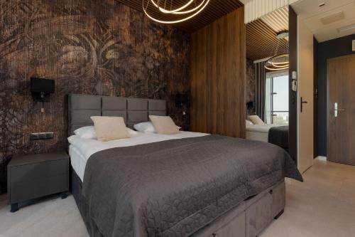 Wola Apartamento | Exceptional Business Apartments by Noclegi Renters