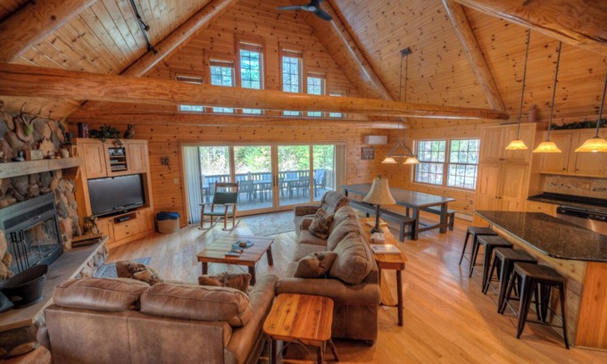 St Germain Cabina | Exceptional log home on 9+ acres with frontage on Big St. Germain Lake