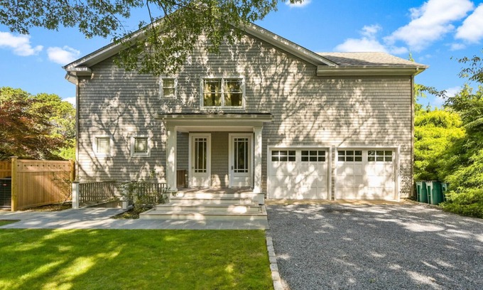 Wainscott Woods Casa | Exceptional shingle-style home sited on just under an acre of land,...