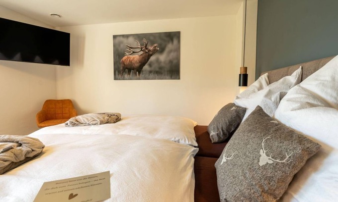 Brimingen Casa | Exclusive suite with whirlpool, sauna 1-2 persons - Ferienhaus Im Lachergarten