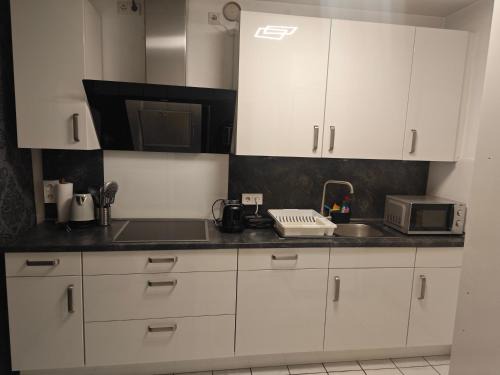 Geilenkirchen Apartamento | Exklusives Apartment in Geilenkirchen für 6 Personen mit Dachterasse und Wintergarten
