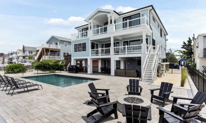 Ship Bottom Casa | Expansive Bayfront Home w/ Heated Saltwater Pool & Dock