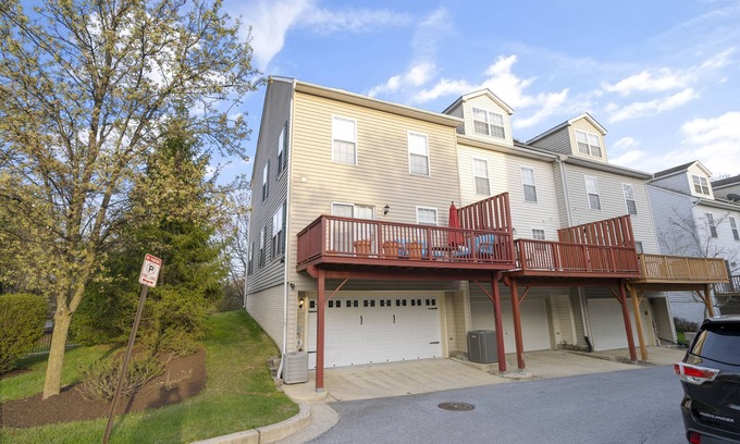 Owings Mills Casa | Experience Elevated Comfort: Luxe Breeze Townhouse.