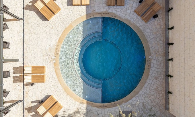 Fredericksburg Hotel | Experience Fredericksburg | Tillie Suite, Pool, & Main Street Moments