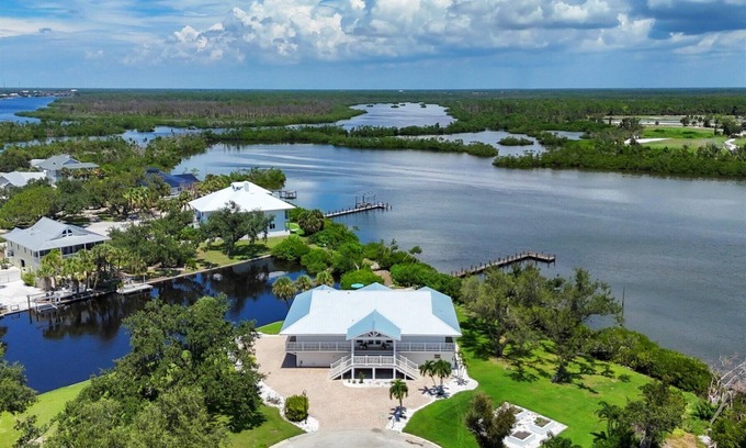 Cape Haze Casa | Experience luxury at The Lookout, a 3-bedroom home in scenic Placida, FL with ocean views.