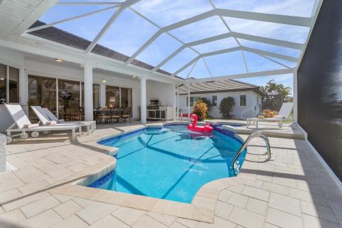 Pelican Casa | Experience Luxury- Gulf Access, Stunning Canal Views, Heated Pool- Villa Avalon - Roelens