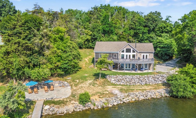 Pulaski Casa | Experience the perfect blend of rustic charm and modern luxury in this Claytor lakefront retreat