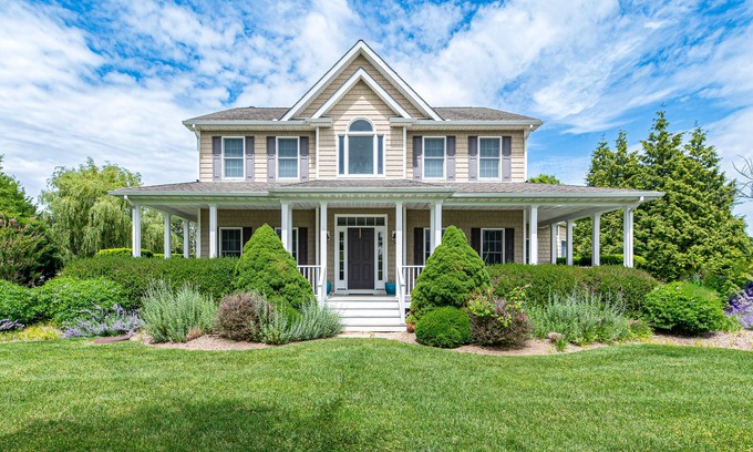 Town of Southold Town Casa | Exquisite dog-friendly home with large yard, furnished porch, & firepit