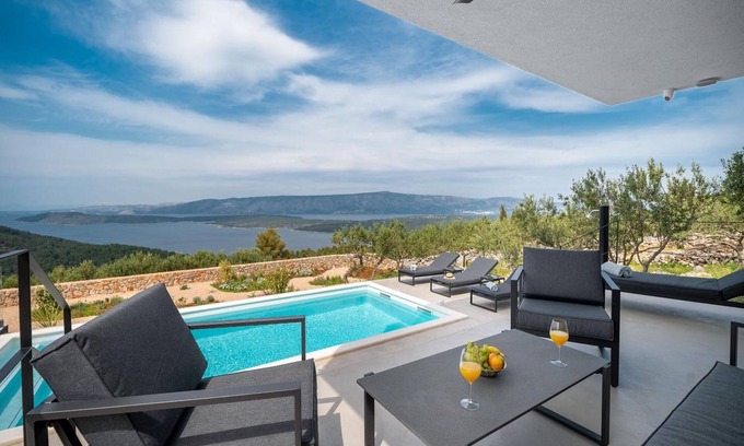 Island Hvar Villa | Exquisite Hvar Villa | Villa Weasley | 3 Bedrooms | Breathtaking Views of the Adriatic Sea | Furnished Sun Terrace | Private Outdoor Pool | Rooftop Shaded Terrace with BBQ facilities and Dining Area | Stari Grad | Selca kod Starog Grada