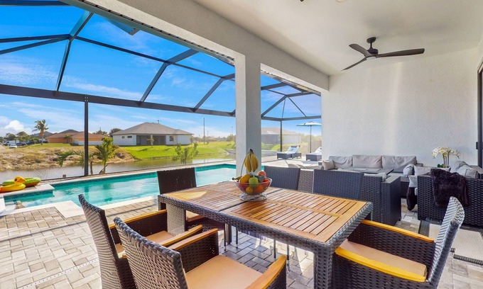 Diplomat Casa | Exquisite riverfront home with pool, lanai, fireplace, W/D, 7 dog-friendly