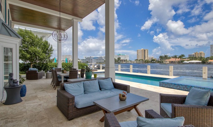 Pompano Isles Casa | Exquisite waterfront home with a pool, large yard, & grill - close to the beach