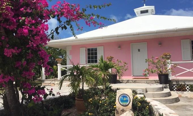 Hartswell Casa | Exuma Hermosa casa frente al mar con muelle en el magnífico puerto de Moriah.