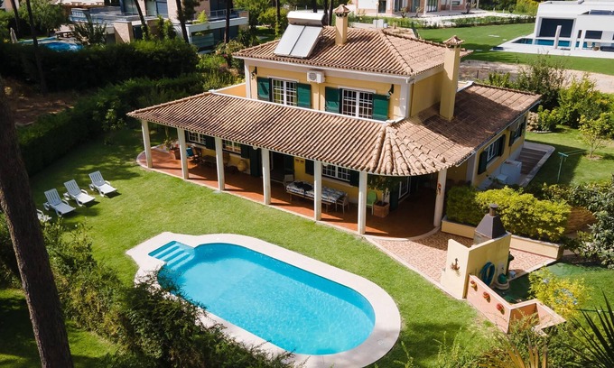 Charneca de Caparica e Sobreda Villa | Villa Aroeira Golf para familias con piscina, jardín, aire acondicionado y Wi-Fi