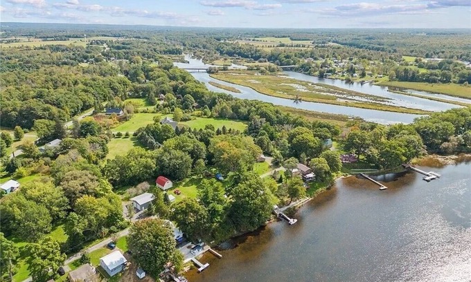 Port Ontario Casa | Fabulous 3-bedroom House on the salmon river with 126 feet of shoreline!
