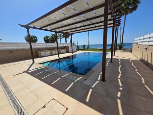 Pervolia Villa | Fabulous beach front house with pool