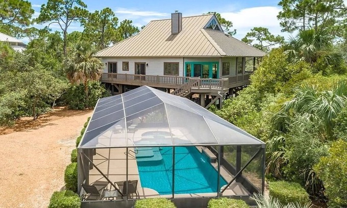 Plantation Casa | FALL SAVINGS! Canal Front, small dog ok, dock, screened private pool!