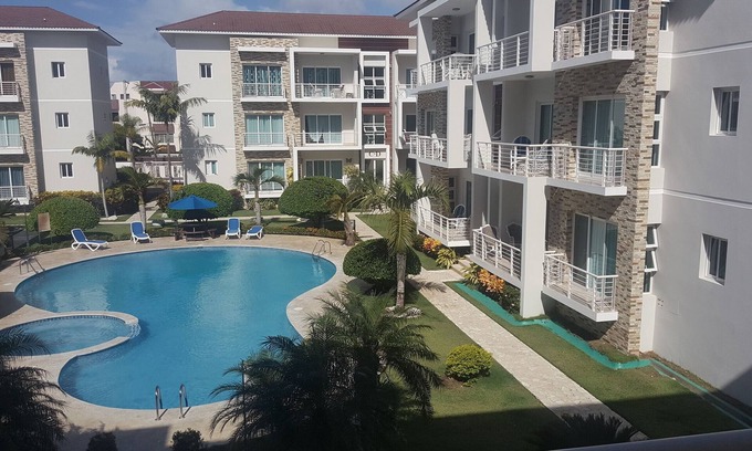 La Esplanada Apartamento | Family-friendly 3BD central Sosua condo wih large pool, WIFI, BBQ, A/C, Cable TV