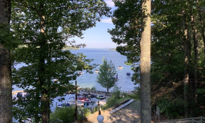 Wolfeboro Casa | Family Friendly house with lakefront views surrounded by trees