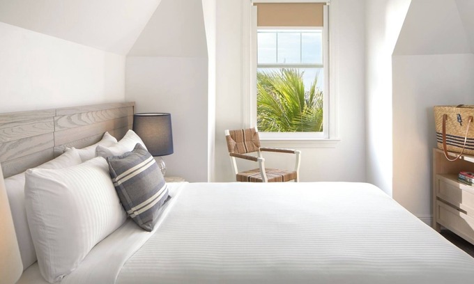 New Town Hotel | Family Fun at a Beachfront Location with Onsite Pools, Parking, Shuttle Service!