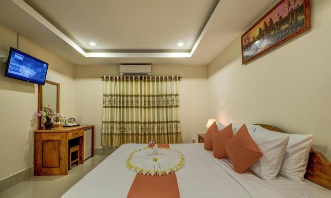 Siem Reap Complejo | Habitación familiar: 1 cama doble y cama individual - desayuno gratis