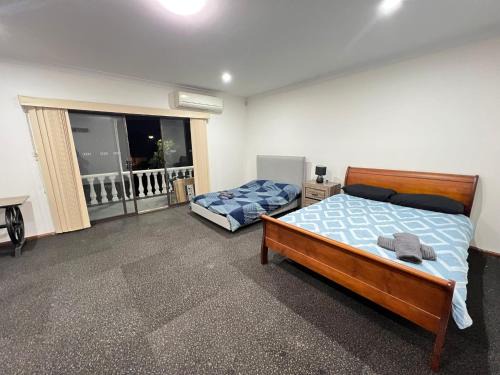 Lurnea Casa | Family Room with Attached Private Balcony - L4