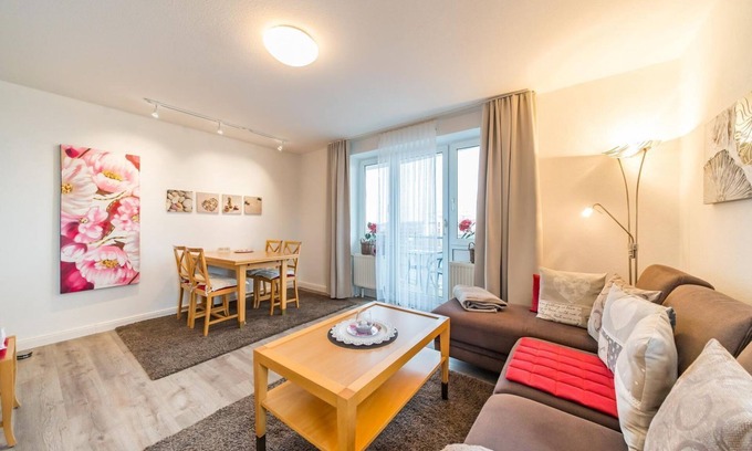 Schillig Apartamento | Family vacation apartment close to the beach on the North Sea with balcony and sea view - Hus